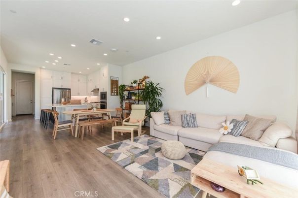 Dining room, Interior, Kitchen, Living room, Recessed Lighting, Stainless Steel Appliances, Wood Texture Flooring