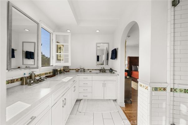 Bathroom, Dual Sink Vanities, Interior, Recessed Lighting, Wood Texture Flooring