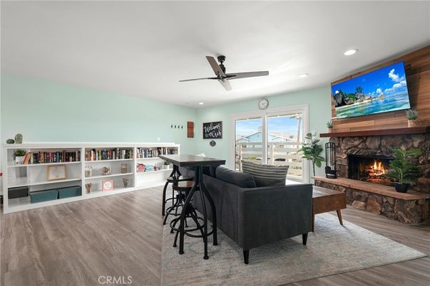 Fireplace, Interior, Living room, Recessed Lighting, Wood Texture Flooring