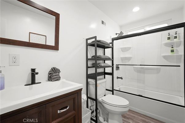 Bathroom, Glass Shower, Interior, Recessed Lighting, Wood Texture Flooring