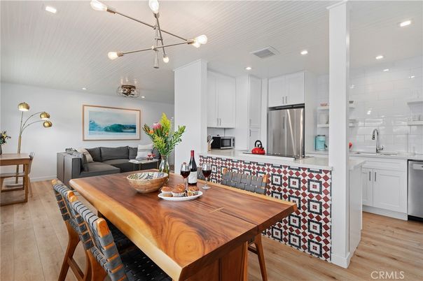 Dining room, Interior, Kitchen, Pendant Lights, Recessed Lighting, Stainless Steel Appliances, Wood Texture Flooring