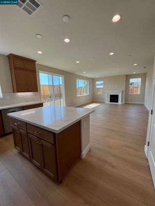 Fireplace, Interior, Kitchen, Recessed Lighting, Wood Texture Flooring