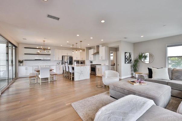Dining room, Interior, Kitchen, Living room, Pendant Lights, Recessed Lighting, Stainless Steel Appliances, Wood Texture Flooring