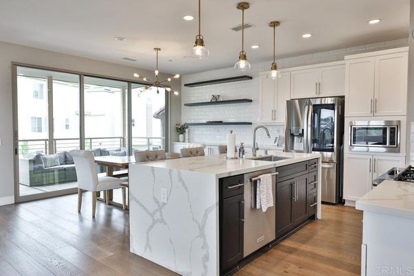 Dining room, Interior, Kitchen, Pendant Lights, Recessed Lighting, Stainless Steel Appliances, Wood Texture Flooring