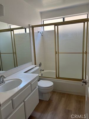 Bathroom, Dual Sink Vanities, Glass Shower, Interior, Wood Texture Flooring