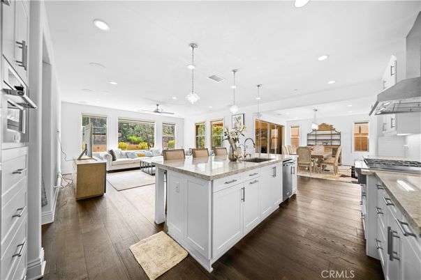 Dining room, Interior, Kitchen, Living room, Pendant Lights, Recessed Lighting, Stainless Steel Appliances, Wood Texture Flooring