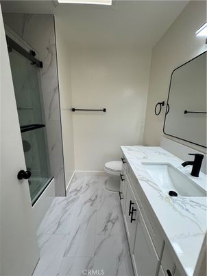 Bathroom, Dual Sink Vanities, Glass Shower, Interior, Marble, Marble Walls
