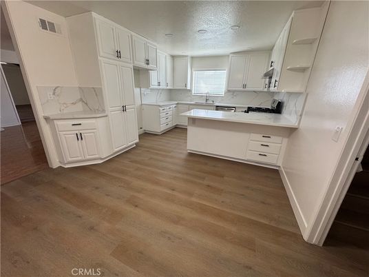 Interior, Kitchen, Marble Walls, Recessed Lighting, Wood Texture Flooring