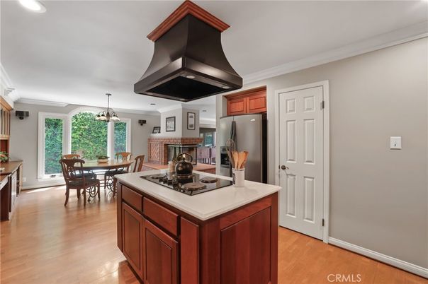 Dining room, Fireplace, Interior, Kitchen, Pendant Lights, Recessed Lighting, Wood Texture Flooring