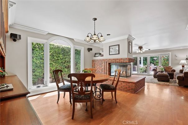 Chandelier, Dining room, Fireplace, Interior, Living room, Pendant Lights, Wood Texture Flooring