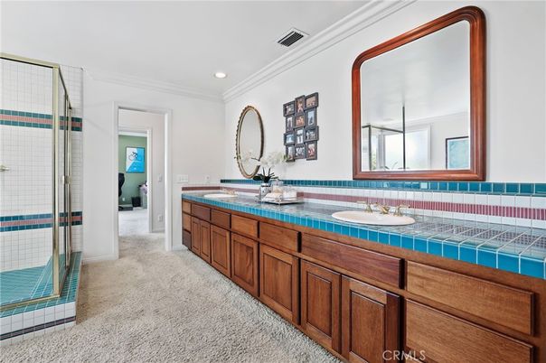 Bathroom, Dual Sink Vanities, Interior, Recessed Lighting, Tile Countertops