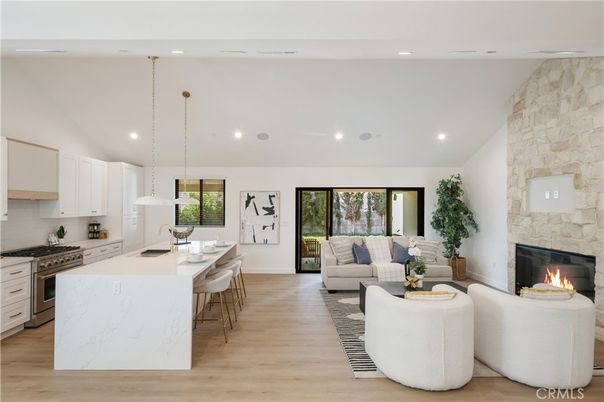 Dining room, Fireplace, Interior, Kitchen, Living room, Pendant Lights, Recessed Lighting, Stainless Steel Appliances, Stone Walls, Wood Texture Flooring