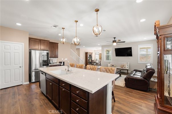 Dining room, Interior, Kitchen, Living room, Pendant Lights, Recessed Lighting, Stainless Steel Appliances, Wood Texture Flooring