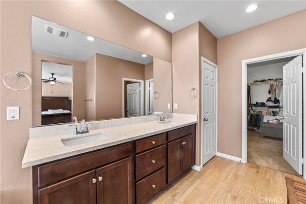 Bathroom, Dual Sink Vanities, Interior, Recessed Lighting, Wood Texture Flooring