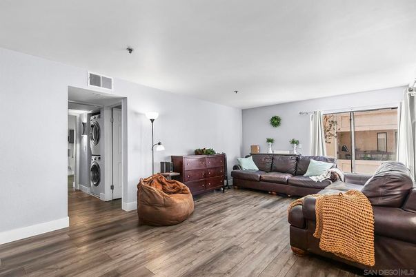 Interior, Living room, Utility Closets, Washer, Wood Texture Flooring