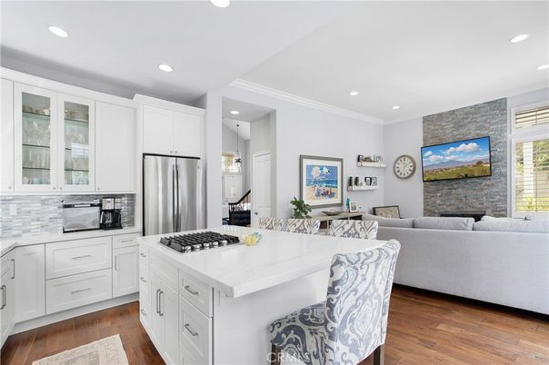 Interior, Kitchen, Living room, Recessed Lighting, Stainless Steel Appliances, Stone Walls, Wood Texture Flooring