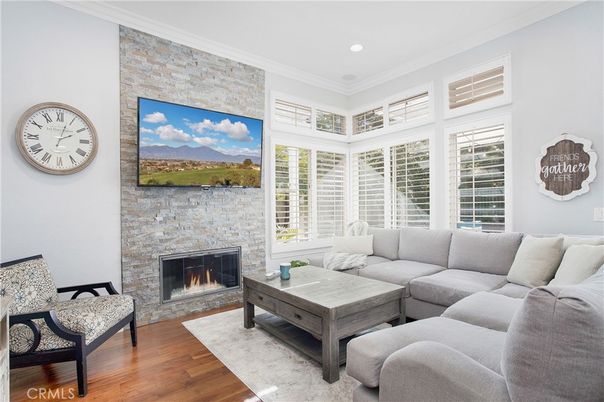 Fireplace, Interior, Living room, Recessed Lighting, Stone Walls, Wood Texture Flooring