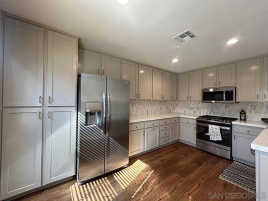 Interior, Kitchen, Recessed Lighting, Stainless Steel Appliances, Wood Texture Flooring