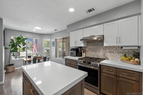 Dining room, Interior, Kitchen, Recessed Lighting, Stainless Steel Appliances, Wood Texture Flooring