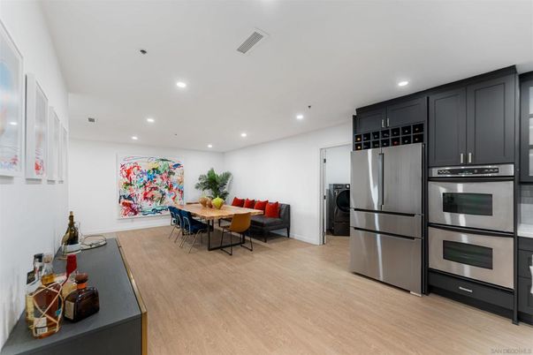 Dining room, Interior, Kitchen, Recessed Lighting, Stainless Steel Appliances, Wood Texture Flooring