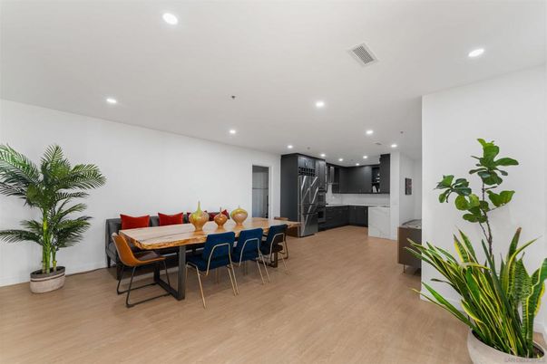 Dining room, Interior, Kitchen, Recessed Lighting, Stainless Steel Appliances, Wood Texture Flooring
