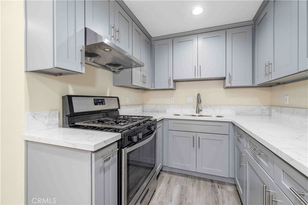 Interior, Kitchen, Marble Walls, Recessed Lighting, Wood Texture Flooring