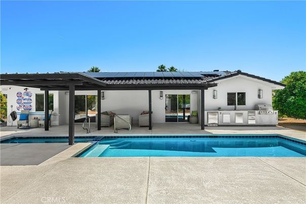 Exterior, Pool, Solar Panels