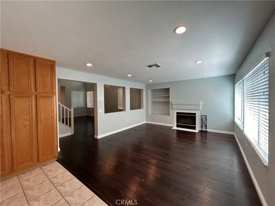 Empty room, Fireplace, Interior, Recessed Lighting, Wood Texture Flooring