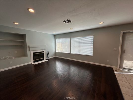 Empty room, Fireplace, Interior, Recessed Lighting, Wood Texture Flooring