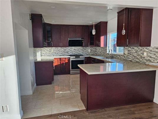 Interior, Kitchen, Pendant Lights, Recessed Lighting, Stainless Steel Appliances, Wood Texture Flooring