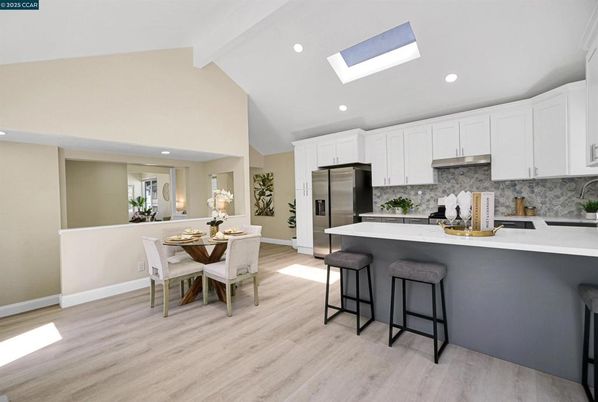 Dining room, Interior, Kitchen, Recessed Lighting, Stainless Steel Appliances, Wood Texture Flooring
