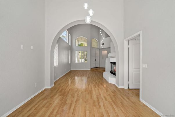 Empty room, Fireplace, Interior, Pendant Lights, Recessed Lighting, Wood Texture Flooring