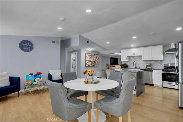 Dining room, Interior, Kitchen, Recessed Lighting, Stainless Steel Appliances, Wood Texture Flooring