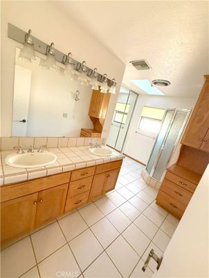 Bathroom, Dual Sink Vanities, Glass Shower, Interior, Tile Countertops