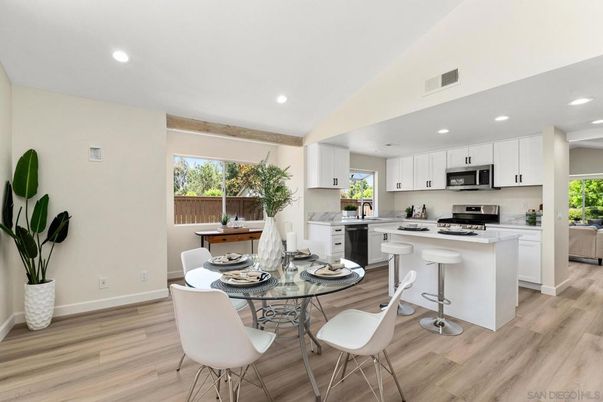 Dining room, Interior, Kitchen, Recessed Lighting, Stainless Steel Appliances, Wood Texture Flooring