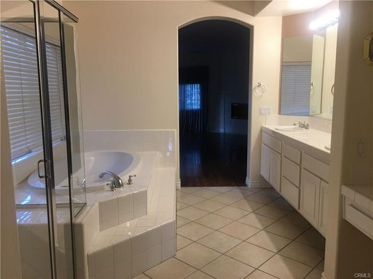 Bathroom, Dual Sink Vanities, Glass Shower, Interior, Wood Texture Flooring