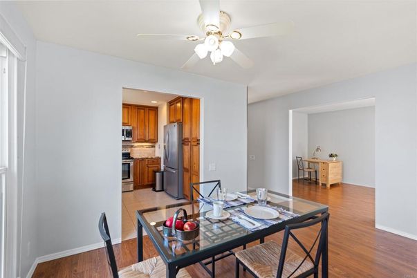 Dining room, Interior, Kitchen, Recessed Lighting, Stainless Steel Appliances, Wood Texture Flooring
