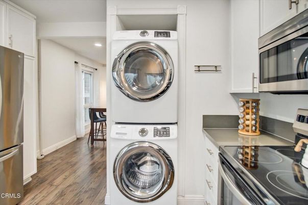 Interior, Kitchen, Recessed Lighting, Utility Closets, Washer, Wood Texture Flooring