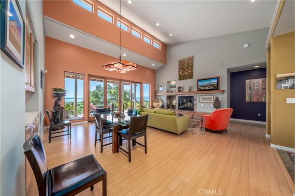 Dining room, Fireplace, Interior, Living room, Pendant Lights, Recessed Lighting, Wood Texture Flooring
