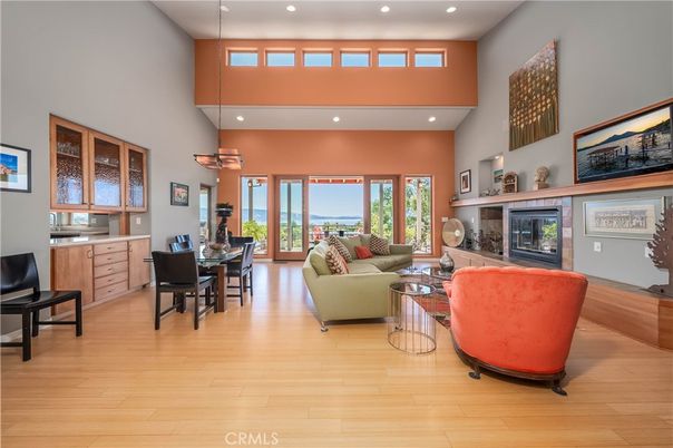 Dining room, Fireplace, Interior, Living room, Recessed Lighting, Wood Texture Flooring