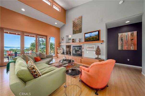 Fireplace, Interior, Living room, Recessed Lighting, Water, Wood Texture Flooring