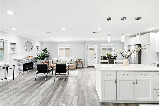 Fireplace, Interior, Kitchen, Living room, Pendant Lights, Recessed Lighting, Wood Texture Flooring