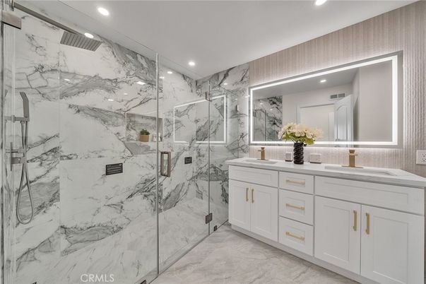 Bathroom, Dual Sink Vanities, Glass Shower, Interior, Marble, Marble Walls, Recessed Lighting