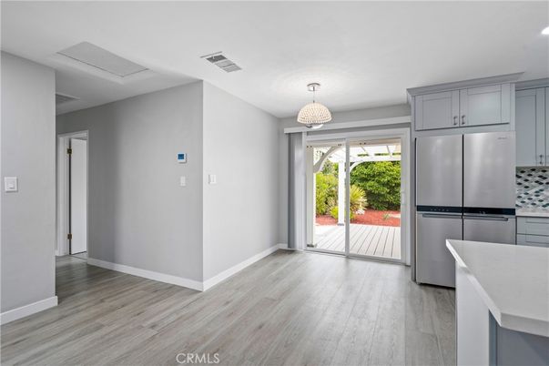 Chandelier, Interior, Kitchen, Recessed Lighting, Stainless Steel Appliances, Wood Texture Flooring