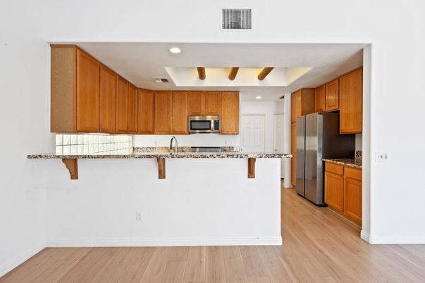 Interior, Kitchen, Recessed Lighting, Stainless Steel Appliances, Wood Texture Flooring