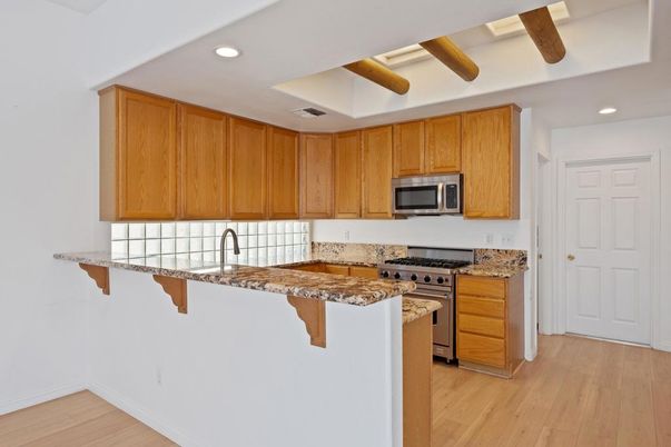 Interior, Kitchen, Recessed Lighting, Stainless Steel Appliances, Wood Texture Flooring