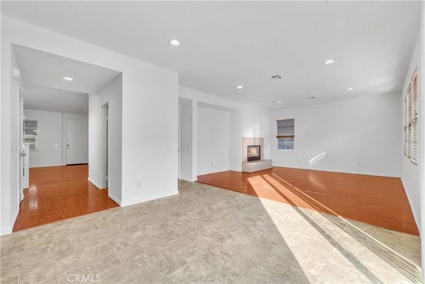 Empty room, Fireplace, Interior, Recessed Lighting, Wood Texture Flooring
