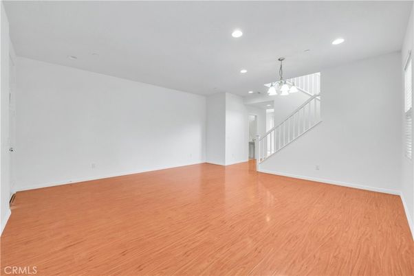 Chandelier, Empty room, Interior, Recessed Lighting, Wood Texture Flooring