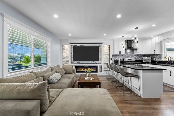 Fireplace, Interior, Kitchen, Living room, Pendant Lights, Recessed Lighting, Stone Walls, Wood Texture Flooring