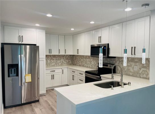 Interior, Kitchen, Pendant Lights, Recessed Lighting, Stainless Steel Appliances, Wood Texture Flooring